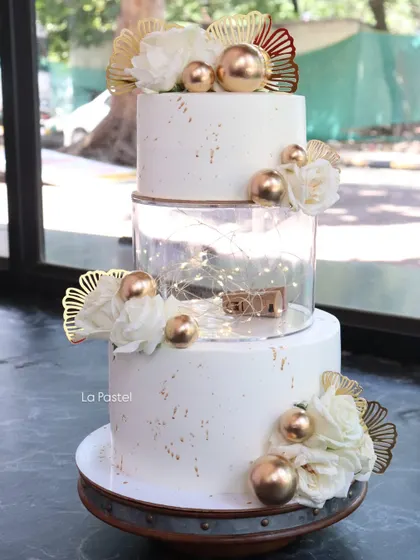 Another angle of the fairy light wedding cake, showing how the lights create a warm, magical glow from within the cake.