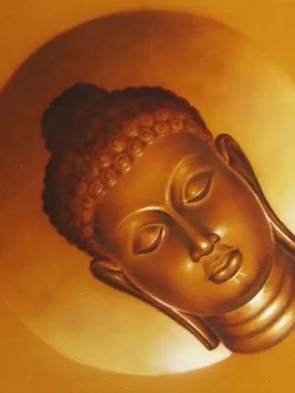 A classic, handcrafted oil painting of Buddha's head, radiating peace and serenity. The warm, golden tones make it a timeless piece for any home seeking a spiritual touch.