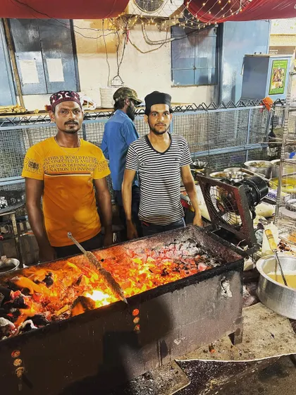 Our staff working hard on the sigdi (charcoal grill) to make sure the food reaches you hot and tempting.