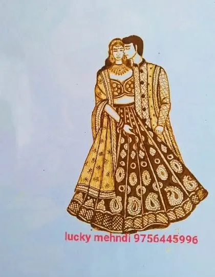 A beautiful sketch of a couple in their wedding attire, ready to be turned into a stunning mehndi design. This is where the planning for a portrait mehndi begins.