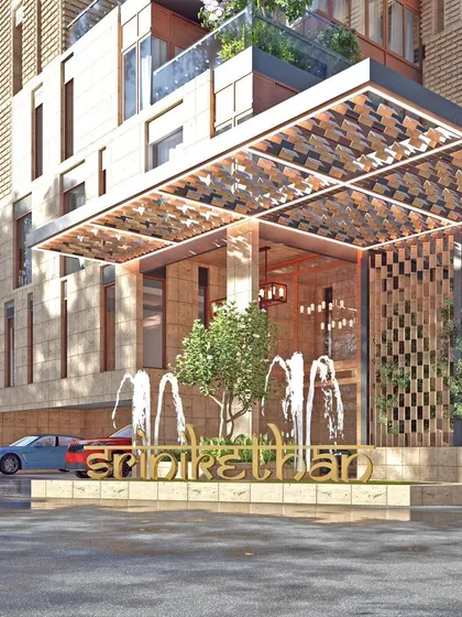 The entrance canopy and water feature for 'Sriniketan', a guesthouse for pilgrims in Tirupati. The design uses ornate, traditional patterns in a contemporary way to create a spiritual and welcoming arrival experience.