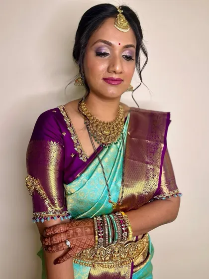 A close-up of the eye makeup, showing the blend of purple and shimmer. This look is perfect for an evening event where you want to make a statement.