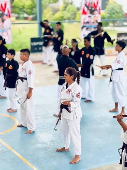 Participants of all ages stand ready during the martial arts seminar, showcasing the inclusive nature of the events we host.