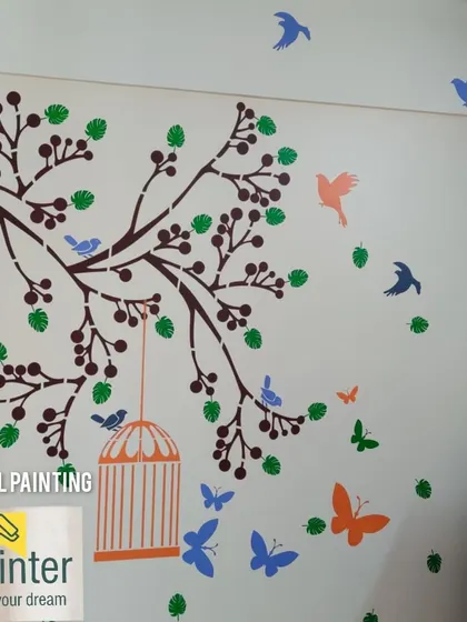 A colorful and lively stencil design featuring a tree branch with birds and butterflies. Using multiple colors like green, blue, and orange, we created a cheerful and dynamic scene perfect for any room.