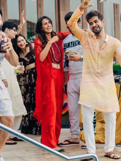 Guests enjoying the poolside vibes at a destination wedding Mehendi in Goa. My job is to create a relaxed yet celebratory atmosphere where everyone can have a great time.