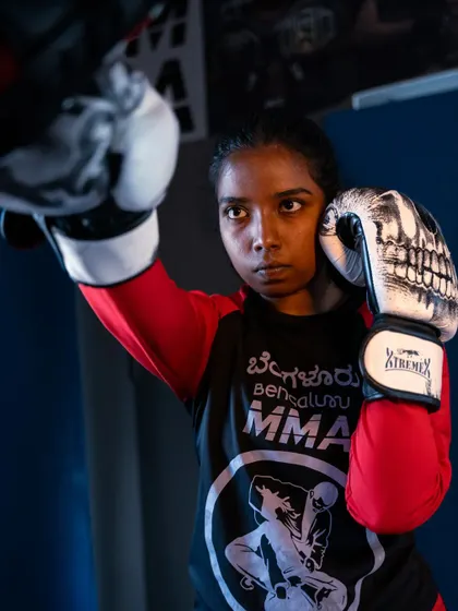 Another angle of our student honing her boxing skills. The intensity in her eyes shows the mental focus that martial arts develops. Each punch is a step towards becoming stronger and more self-reliant.