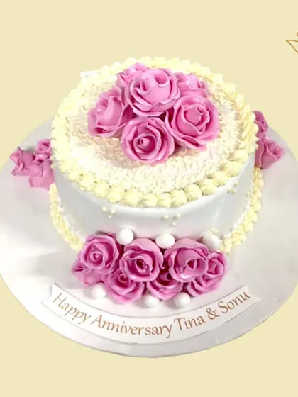 Love in full bloom for Tina and Sonu's anniversary in Gurugram. This lovely cake is covered in beautiful pink buttercream roses, creating a romantic and celebratory dessert.