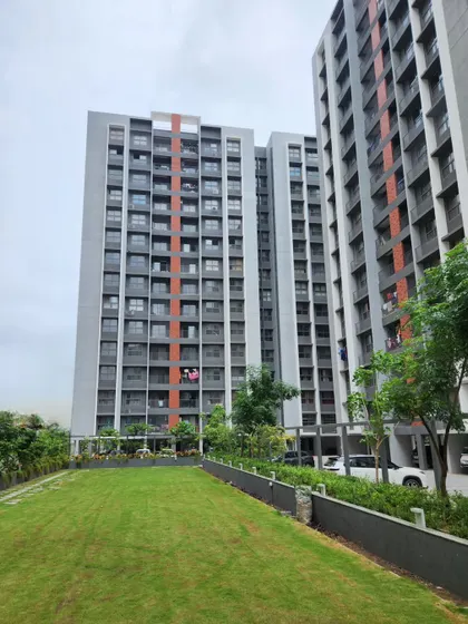 A view of the landscaped lawn at Adani Amogha in Ahmedabad. Creating usable green space is a priority in our township designs, offering residents a place for relaxation and community interaction.