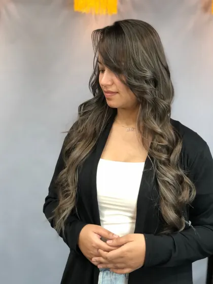 Another look at the cool-toned platinum blonde balayage, highlighting the seamless blend and the beautiful, shimmering finish.