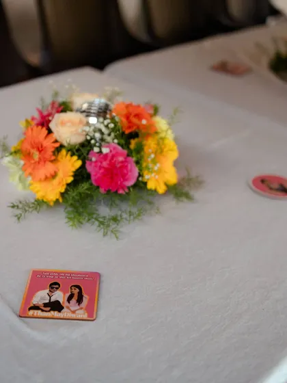 A close-up of our custom-designed wedding coasters, a small detail that makes a big impact and serves as a wonderful keepsake for guests.