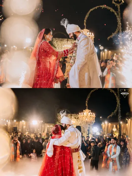 A magical Varmala exchange, illuminated by sparklers and surrounded by loved ones. I focus on capturing the atmosphere of the moment, from the grand pyrotechnics to the intimate embrace.