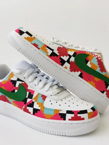 A dynamic shot of the Dhurrie weave sneakers. This pair is a perfect example of how traditional Indian textiles can be re-imagined for modern streetwear.
