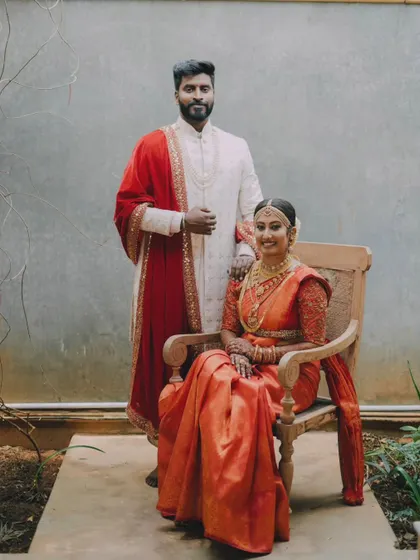 A duplicate of the regal portrait with the bride seated.