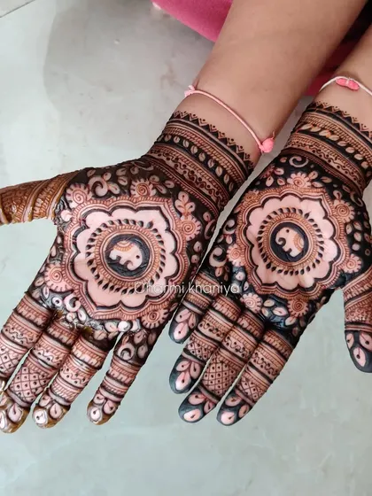 A cute and classic design for the wedding party, featuring a small elephant inside a floral mandala. It’s a perfect mix of traditional and fun.
