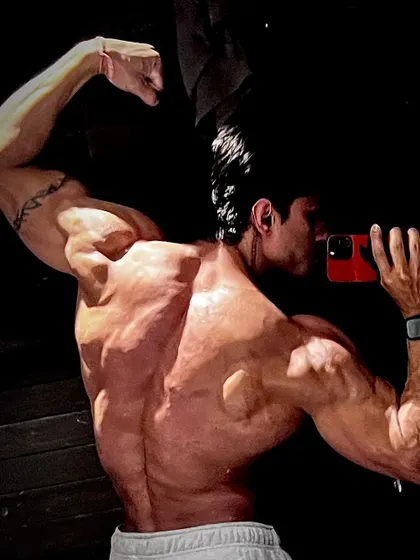 A back and arm pose, symbolizing the strength gained from persevering through challenges.