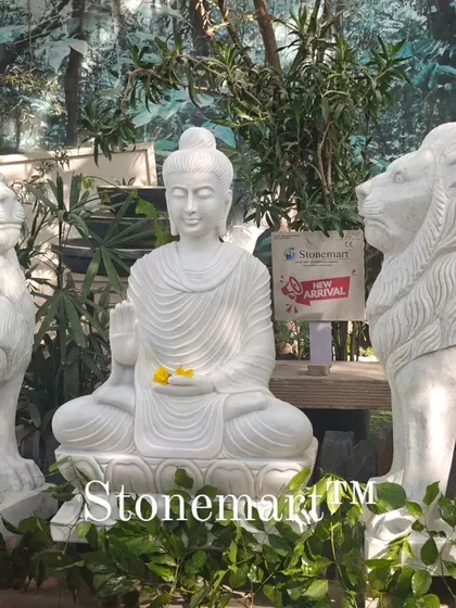 This grand display features a 4-foot white marble Buddha statue flanked by a pair of majestic 4-foot marble lions. This arrangement is perfect for creating a powerful and serene entrance for a farmhouse, hotel, or luxury residence, showcasing our ability to create large-scale garden ornaments.