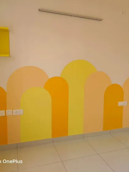 A final look at the completed arch mural, showcasing the clean execution and happy color palette.