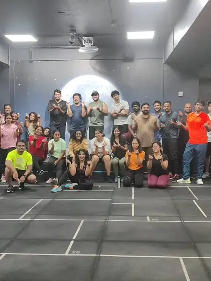 The heart and soul of my classes. Each photo captures a unique moment with my incredible community after a sweaty, joyful session. This is our shared victory lap.