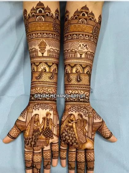 A grand design featuring wedding portraits on the palms and architectural details extending up the arms.
