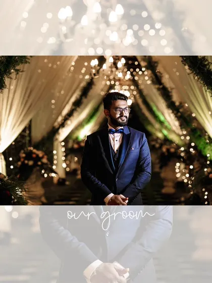 A stunning portrait of the groom at his reception, framed by a beautifully lit entranceway with chandeliers and drapes.