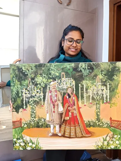 Holding up the finished painting in my studio after a live event in Gurugram. The final touches bring the entire piece together.