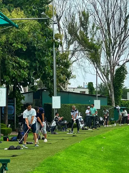 A busy Sunday on the range, with every bay filled with golfers honing their skills and enjoying the weekend.
