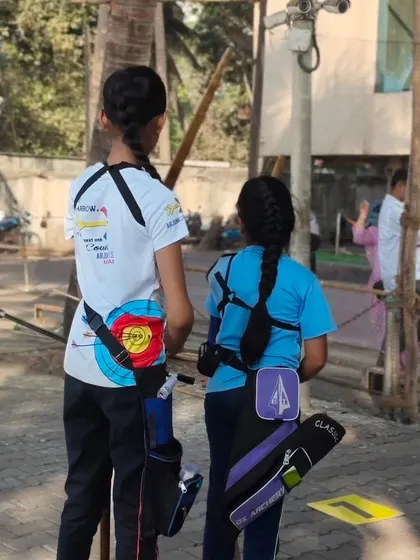 Two young archers ready on the line. We are excited to see where their archery journey takes them.
