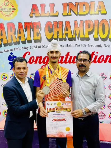 With my coach and another official after the Senior National 2024. It takes a team to build a champion.