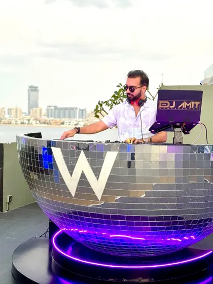 The disco ball DJ booth was definitely a highlight. It's all about creating a memorable visual and auditory experience.
