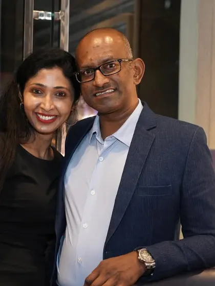 A happy couple posing for the camera. Our socials are a great place to make memories with friends and partners.