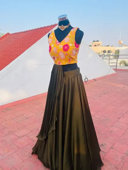 A side view showing the interesting silhouette of this fusion lehenga.