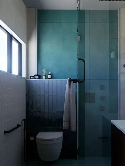 A concept for a beautifully calm bathroom. The design uses a dark, textured tile for the wet area, creating a dramatic contrast with the lighter walls. The large window brings in natural light, making the space feel serene and connected to the outdoors.