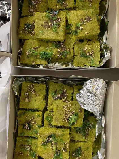 A close-up of the Pani Puri Dhokla, showing the delicious texture and toppings.