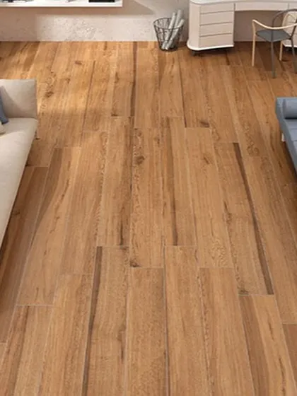 This overhead view shows a rustic-style wood floor with wide planks and a natural finish. I chose this style to add character and a sense of history to the space, making it feel grounded and authentic.