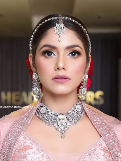 A close-up of our premium bridal makeup. This look features perfectly blended eyeshadow, sharp contouring, and a matte lip, all coming together for a picture-perfect, high-definition finish that lasts all day.