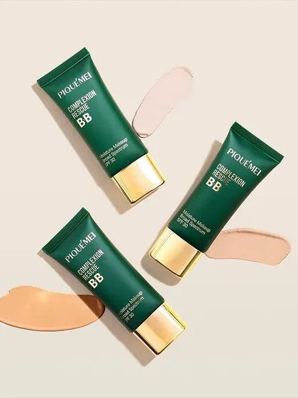 Clean, elegant swatches of PiqueMei's BB cream. This top-down flatlay shot showcases the different shades available in a neat and aesthetically pleasing composition, which is highly useful for customers choosing their color.