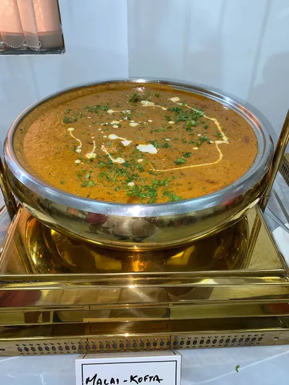 Soft, melt-in-your-mouth dumplings made of paneer and potato are served in a creamy and aromatic gravy in our Malai Kofta. This is a luxurious dish perfect for special occasions.