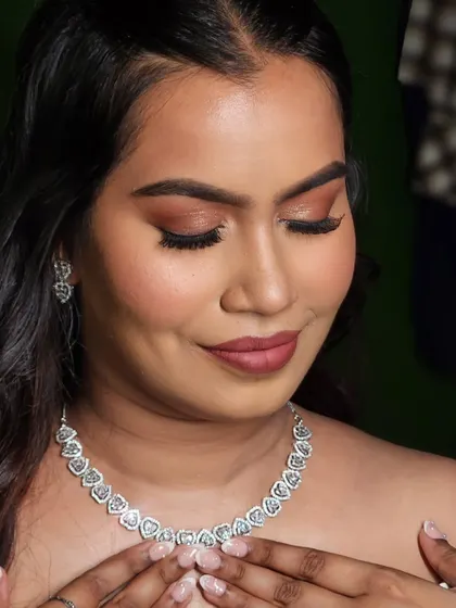Another angle of this stunning makeup look. The focus is on the beautifully blended eyeshadow and the flawless skin finish.