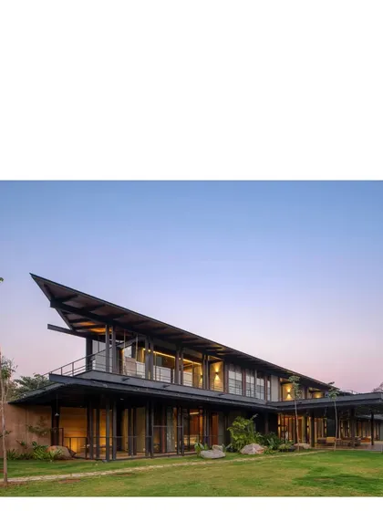 The Lakeshore house at twilight. The project is now complete, and as the landscape matures over the next few years, the duet between the site and the architecture will only grow stronger.