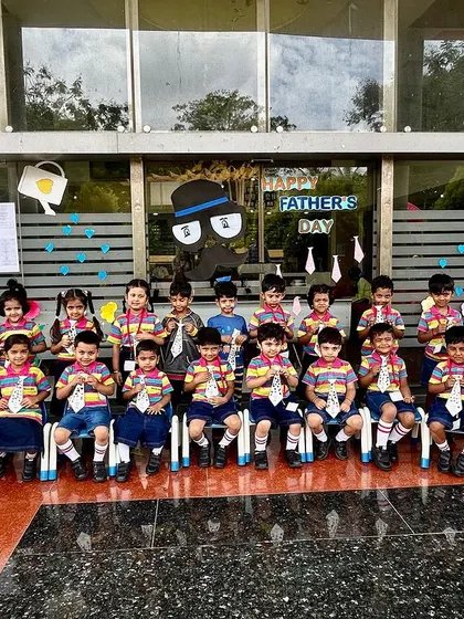 A class photo capturing the joy and pride of our students with their completed Father's Day cards.