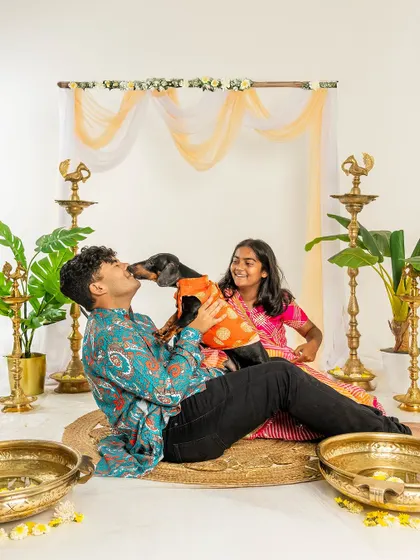 A family with their Dachshund enjoying the Diwali mini-session. It's a beautiful way to include every member of the family in the celebration.