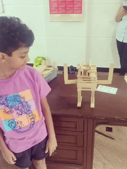 The focus in the room is always so real and inspiring. Each child gets their own set of planks and a space to bring their ideas to life, learning about balance and dedication through hands-on building.