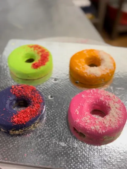 A duplicate of image 38, showing the finished Holi dognuts.