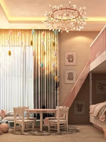 A magical bedroom designed for siblings, featuring a bunk bed with an integrated slide. The soft pink color scheme, whimsical hanging decorations, and a dedicated play table make this room a fairytale come to life.