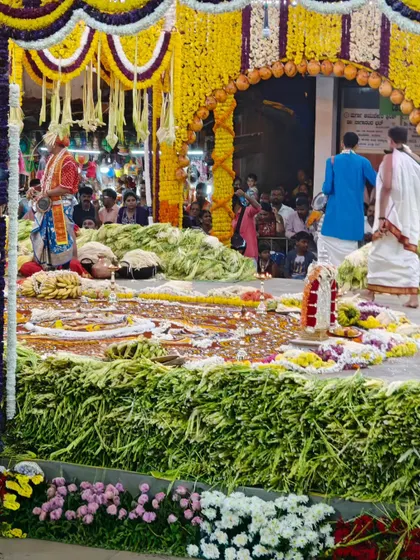 The stage, or 'mantapa,' decorated with massive amounts of flowers and 'hombale' for the all-night Nagamandala ceremony.