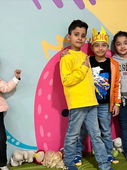 The birthday boy is king for the day! Posing with his friends after a fun-filled party at The Reading Room.