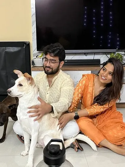 Bella and her sister Coffee with their loving parents. This is what a happy forever family looks like.