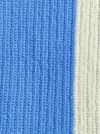 A close-up of the ribbed texture on my handmade newborn baby blanket.