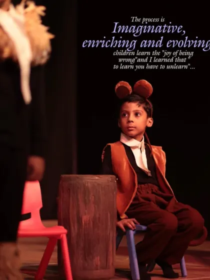 A young actor in costume, deep in character. The process is imaginative and enriching, teaching children that to learn, you sometimes have to unlearn.