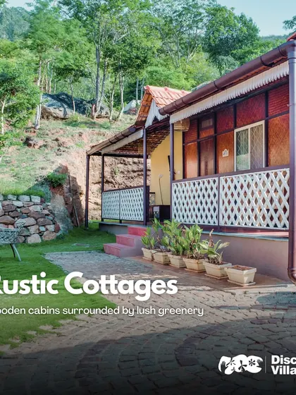 Our rustic wooden cabins at Nandi Hills are surrounded by lush greenery, offering a picturesque and tranquil stay.